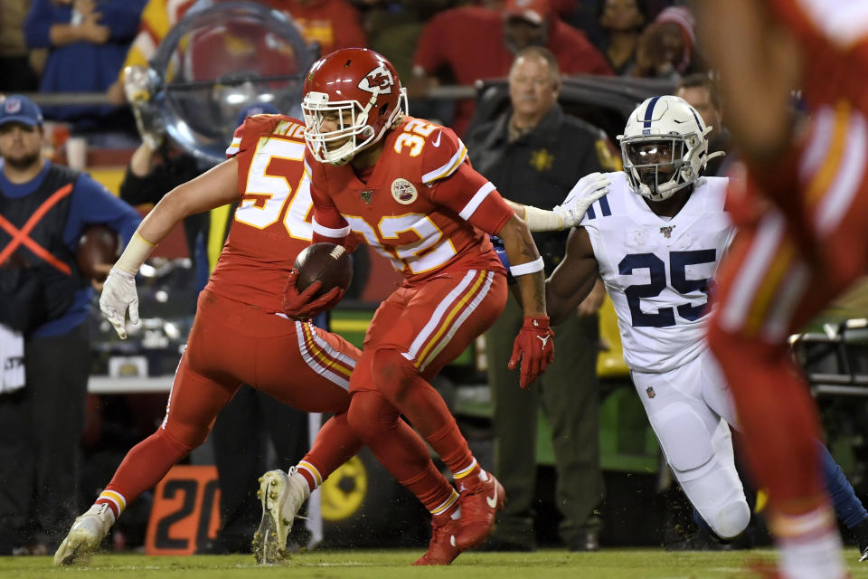 Kansas City Chiefs safety Tyrann Mathieu (32) intercepts a pass intended for Indianapolis Colts running back Marlon Mack (25) during the first half of an NFL football game in Kansas City, Mo., Sunday, Oct. 6, 2019. (AP Photo/Reed Hoffmann)