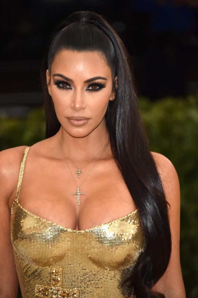 Kim Kardashian West Pulls a '90s Supermodel Move at the Met Gala