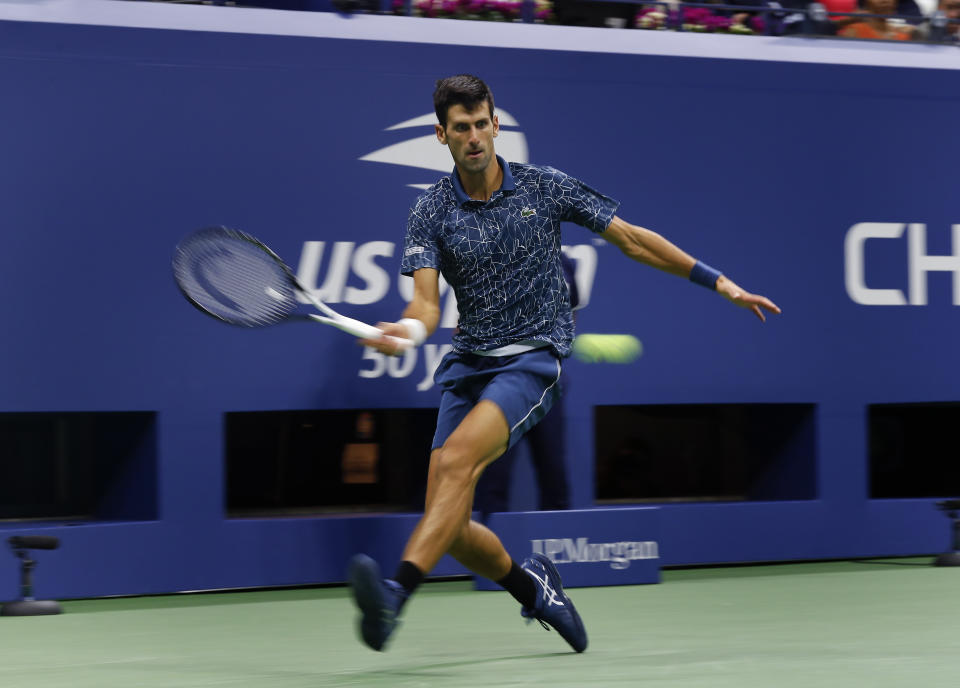 Novak Djokovic, of Serbia, returns a shot to Juan Martin del Potro, of Argentina, during the men's final of the U.S. Open tennis tournament, Sunday, Sept. 9, 2018, in New York. (AP Photo/Adam Hunger)