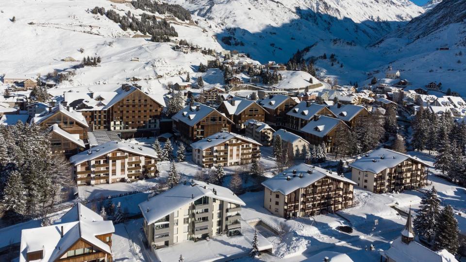 aerial view of the andermatt village on a sunny winter day in switzerland