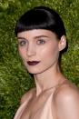 <p>For her breakout role in <em>The Girl in the Dragon Tattoo,</em> Mara fully committed to the edgy character, cutting her hair into a short pixie with micro-bangs and dying it jet black. </p>