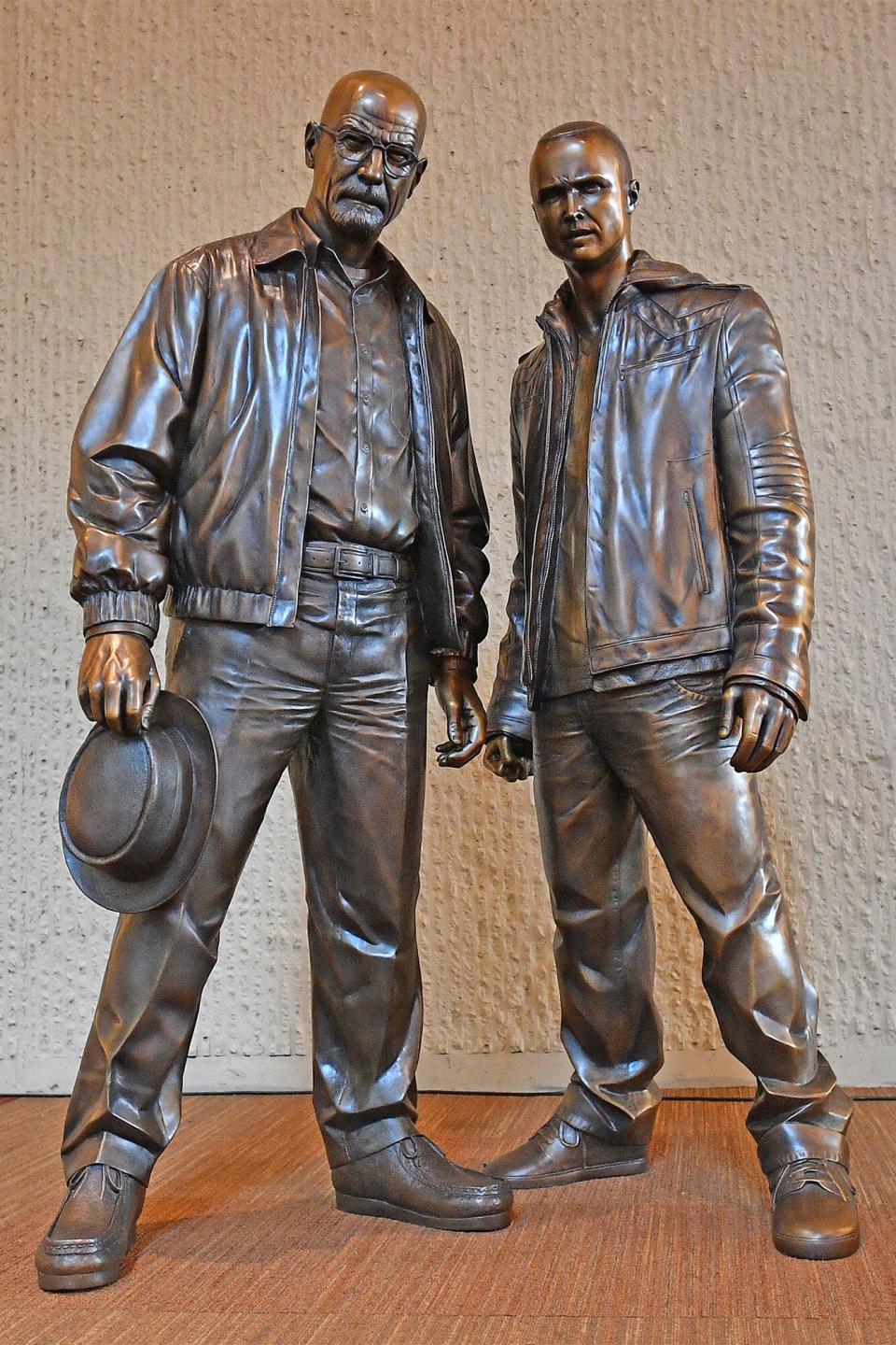 ALBUQUERQUE, NEW MEXICO - JULY 29: Bronze statues depicting television characters Walter White, played by actor Bryan Cranston, and Jesse Pinkman, played by actor Aaron Paul, from the series "Breaking Bad" are displayed after an unveiling ceremony at the Albuquerque Convention Center on July 29, 2022 in Albuquerque, New Mexico. The statues were commissioned in 2019 by Sony Pictures Television and were sculpted by artist Trevor Grove and cast by Burbank, California-based American Fine Arts Foundry. (Photo by Sam Wasson/Getty Images)