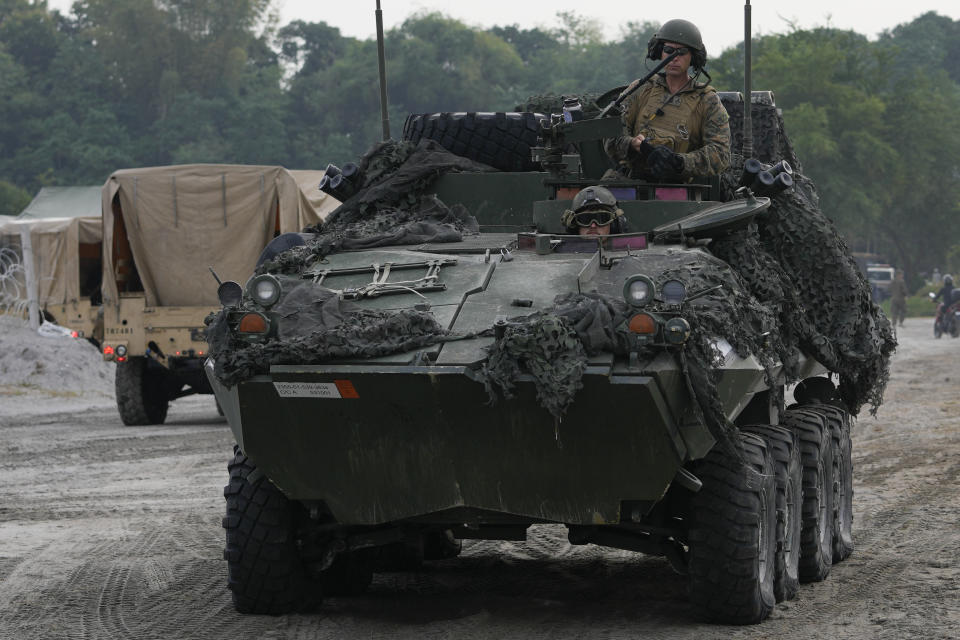 American Marines participate in annual combat drills between the Philippine Marine Corps and U.S. Marine Corps in Capas, Tarlac province, northern Philippines, Thursday, Oct. 13, 2022. Truck-mounted launchers blasted off rockets Thursday and U.S. stealth fighter jets streaked across the northern Philippine sky in a combat drill and latest display of American firepower in a region where Washington has tried to deter what it warns as China's growing aggression. (AP Photo/Aaron Favila)