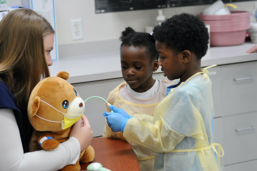 Francis Tuttle Pre-Nursing students treat stuffed animals. Image courtesy Francis Tuttle Technology Center.