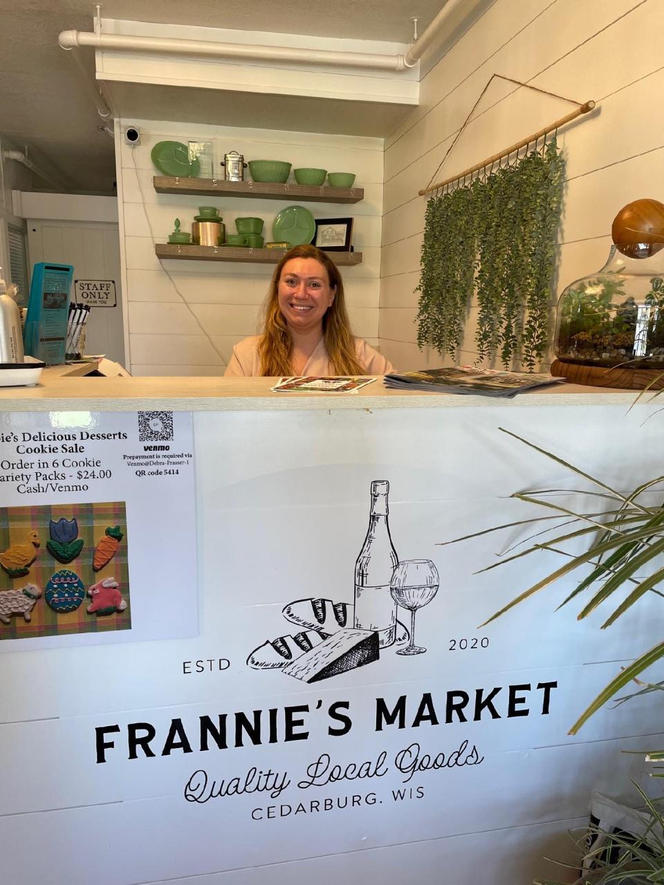 Sarah Prasser works behind the counter at Frannie's Market, where she teaches classes to create charcuterie boards.