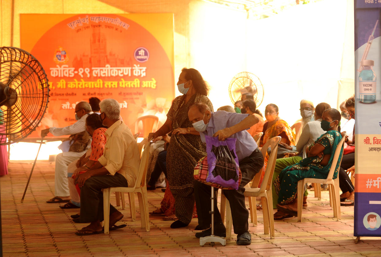 MUMBAI, INDIA  MAY 25: Senior citizens in the above 60 age group get vaccinated against Covid-19 at Samaj Kalyan Kendra Vaccination Centre near Vitthal Mandir, Dahisar, on May 25, 2021 in Mumbai, India. (Photo by Vijay Bate/Hindustan Times via Getty Images)