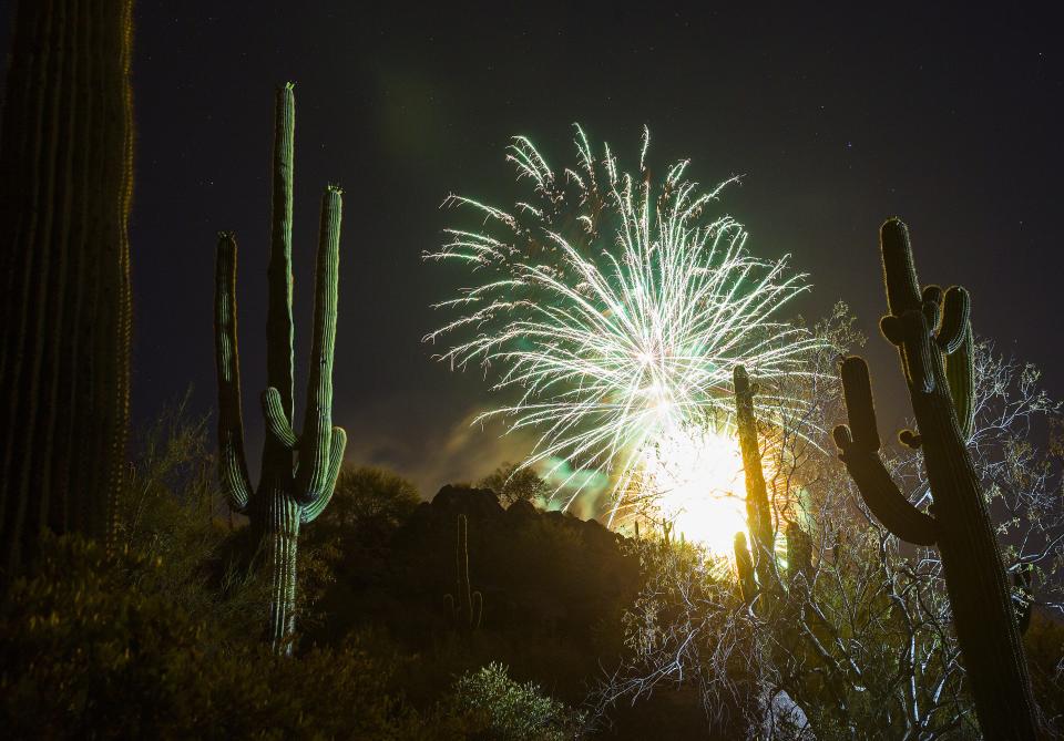 Fireworks from Harold's Corral light up the desert in Cave Creek.