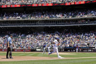 New York Mets' Starling Marte, front right, rounds third base after hitting a home run off of Texas Rangers pitcher Jon Gray during the first inning of a baseball game on Sunday, July 3, 2022, in New York. (AP Photo/Adam Hunger)