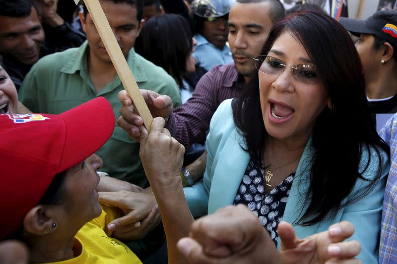 FILE PHOTO: Cilia Flores, deputy of Venezuela's United Socialist Party (PSUV) and wife of Venezuela's President Nicolas Maduro, greets supporters upon her arrival at the National Assembly in Caracas