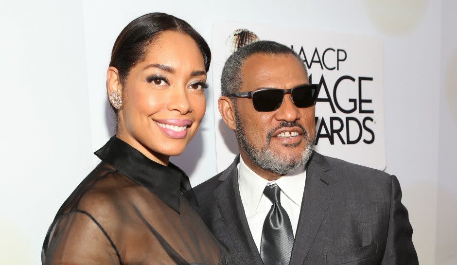 Gina Torres and Laurence Fishburne attend the 46th NAACP Image Awards