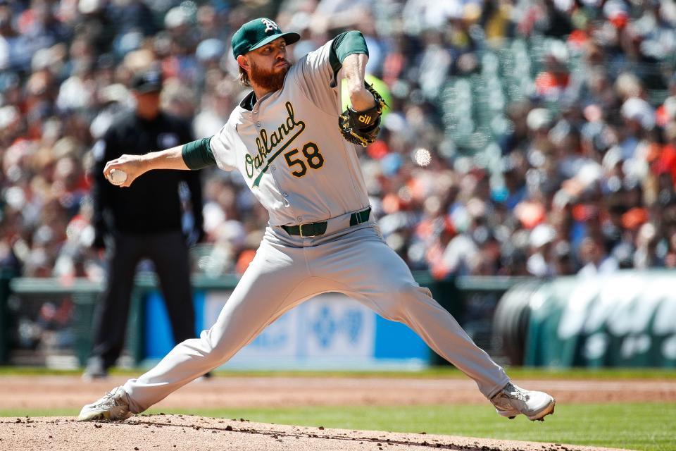 Oakland Athletics pitcher Paul Blackburn (58) throws against Detroit Tigers during the first inning at Comerica Park in Detroit on Saturday, April 6, 2024.