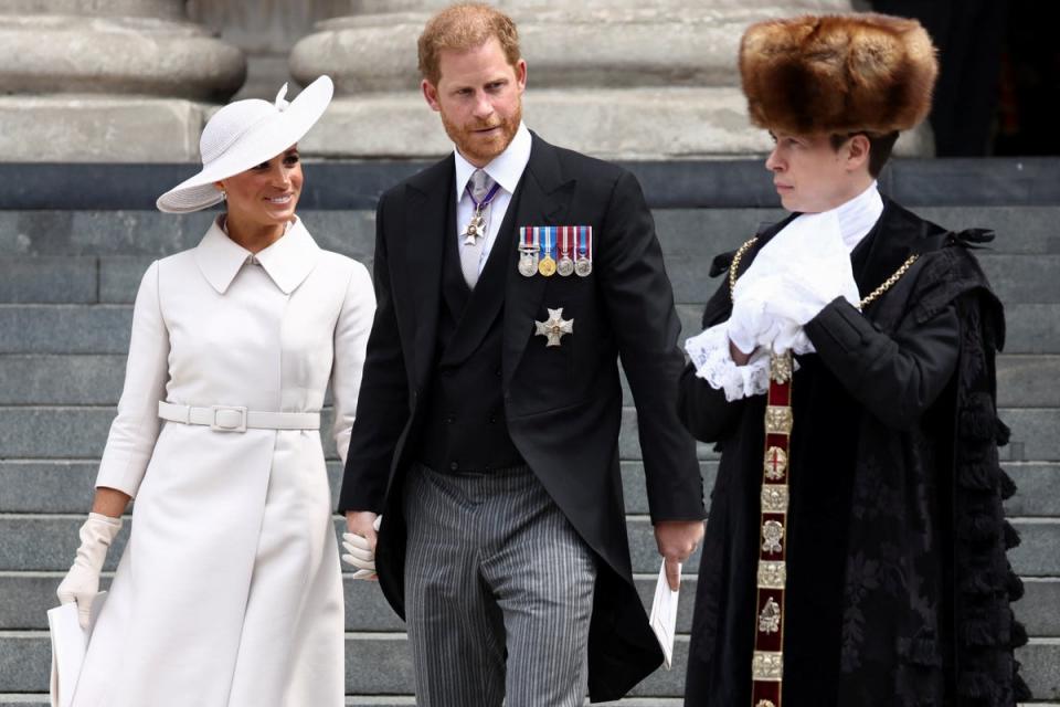 The Sussexes leaving Friday’s service (REUTERS)