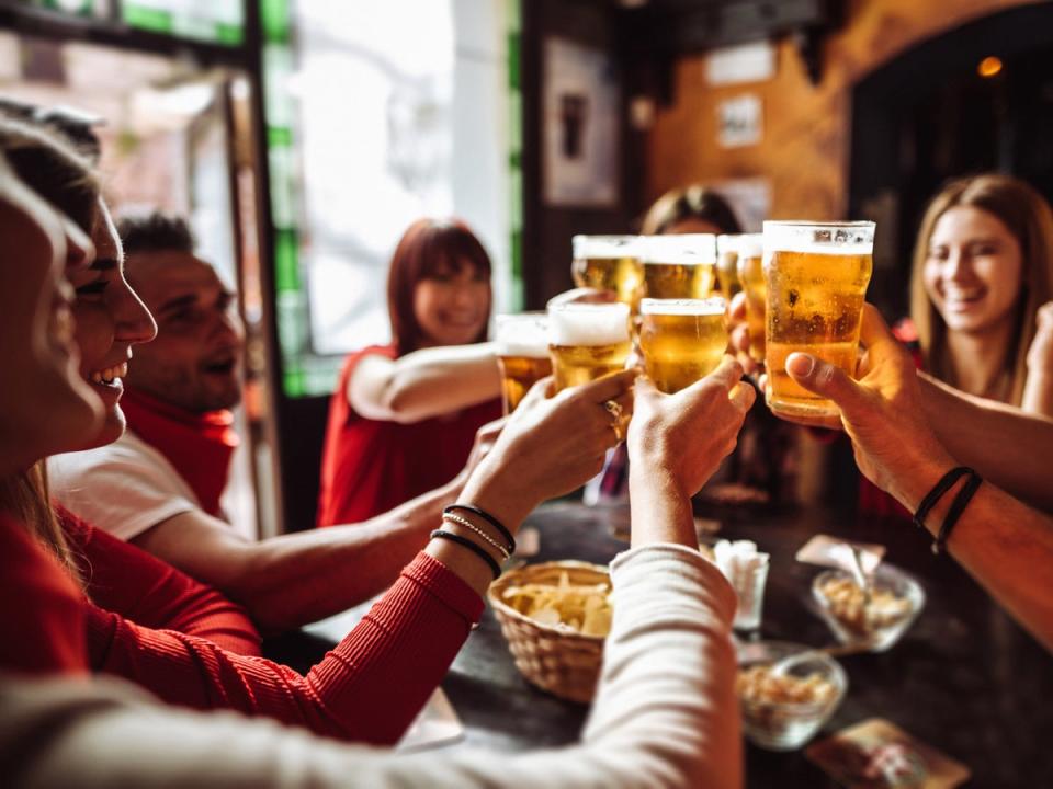 The sight of friends all drinking alcoholic pints may soon become a thing of the past (iStock)