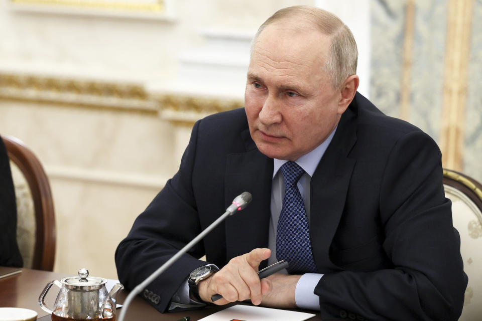 Russian President Vladimir Putin speaks during a meeting with Russian war correspondents who cover a special military operation at the Kremlin in Moscow, Russia, Tuesday, June 13, 2023. (Gavriil Grigorov, Sputnik, Kremlin Pool Photo via AP)