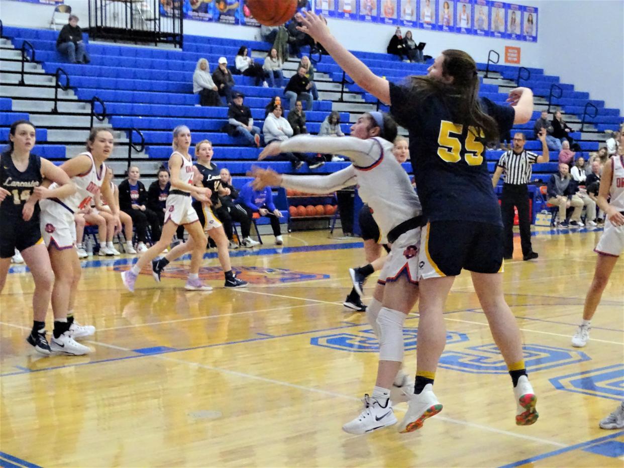 Lancaster's Kylee Johnson goes for a rebound during the Lady Gales' 61-29 non-conference loss on Saturday.