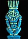 Another find from Sedeinga is this amulet of the god Bes made of glazed faience. Bes was a god often associated with children and pregnant mothers. (Vincent Francigny/SEDAU) <br> <br> <a href="http://www.livescience.com/26900-ancient-pyramids-sudan.html" rel="nofollow noopener" target="_blank" data-ylk="slk:Click here for the full story at LiveScience.com;elm:context_link;itc:0;sec:content-canvas" class="link ">Click here for the full story at LiveScience.com</a>