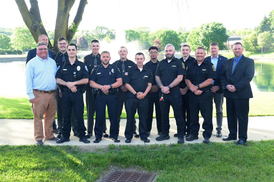 June graduates of the Ohio Peace Officer's Training Academy pose with their instructors. The academy's 25 instructors include many local law enforcement leaders.