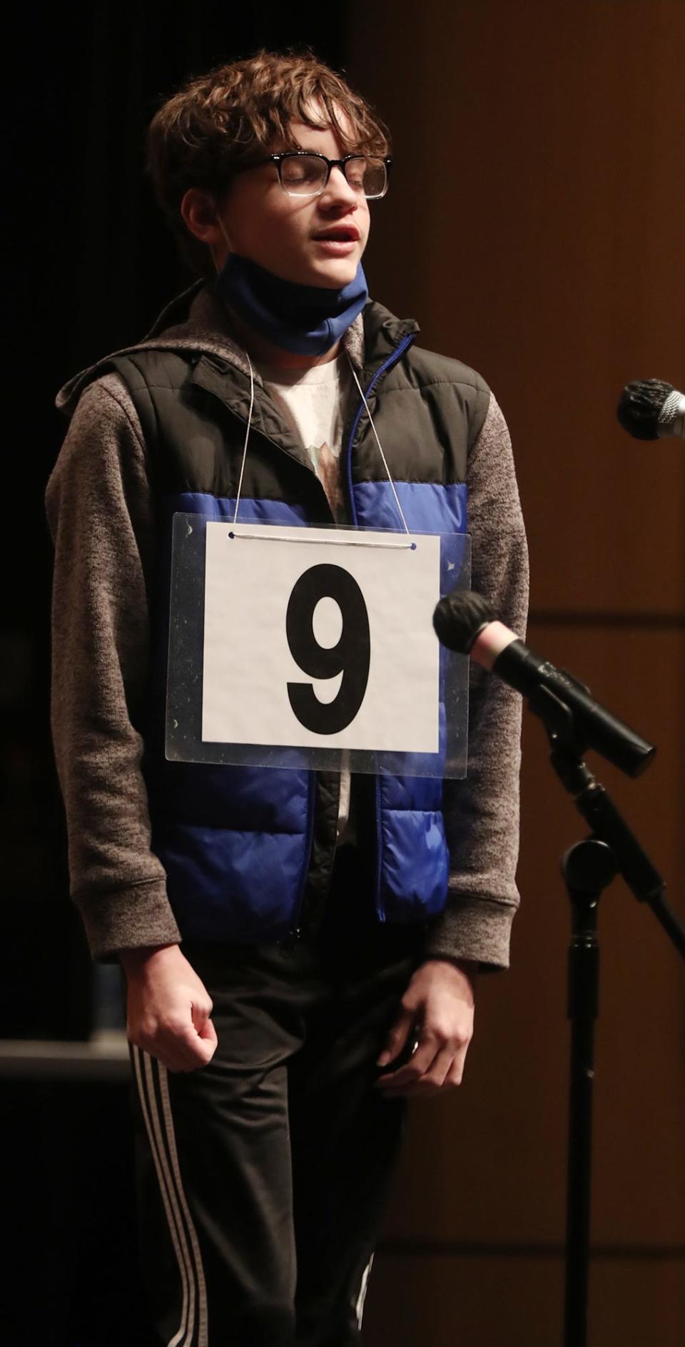 Andrew Yeager of Chippewa High School sighs Saturday, March 12, 2022, after correctly spelling his last word to win the Akron Beacon Journal Regional Spelling Bee at the Akron-Summit County Public Library in Akron. Yeager's victory qualifies him to compete starting May 31 in the Scripps National Spelling Bee outside Washington, D.C.