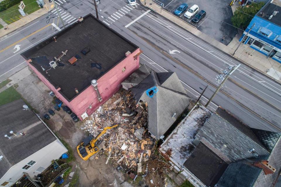 A crew from Diversified Demolition demolishes the former Brooking’s restaurant near the corner of Euclid and Woodland avenues in Lexington on Tuesday, Oct. 26, 2021. Brookings used to serve a chili Adolph Rupp made famous.