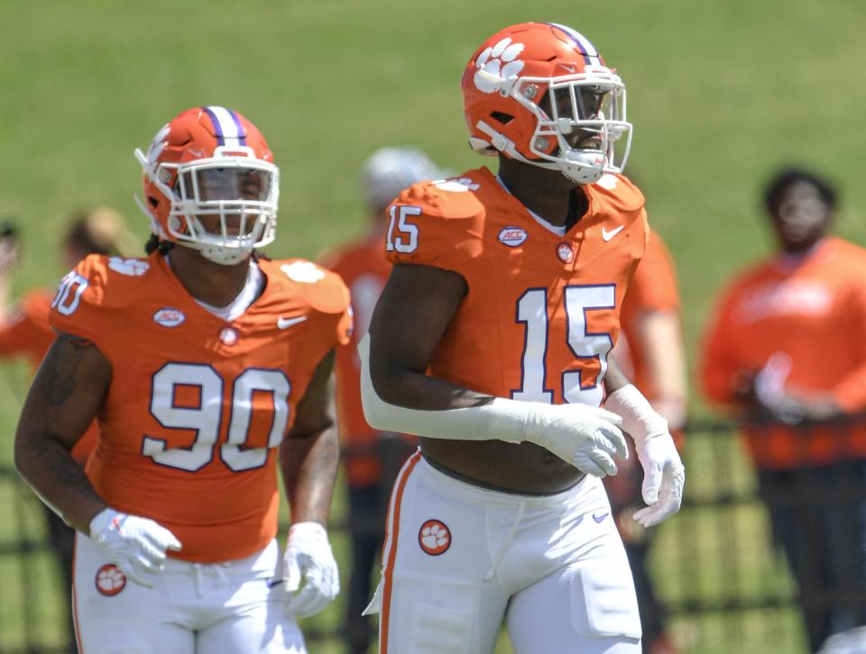 Clemson defensive end Jahiem Lawson (15) and Clemson defensive end Stephiylan Green (90) during the Spring football game in Clemson, S.C. Saturday, April 6, 2024.