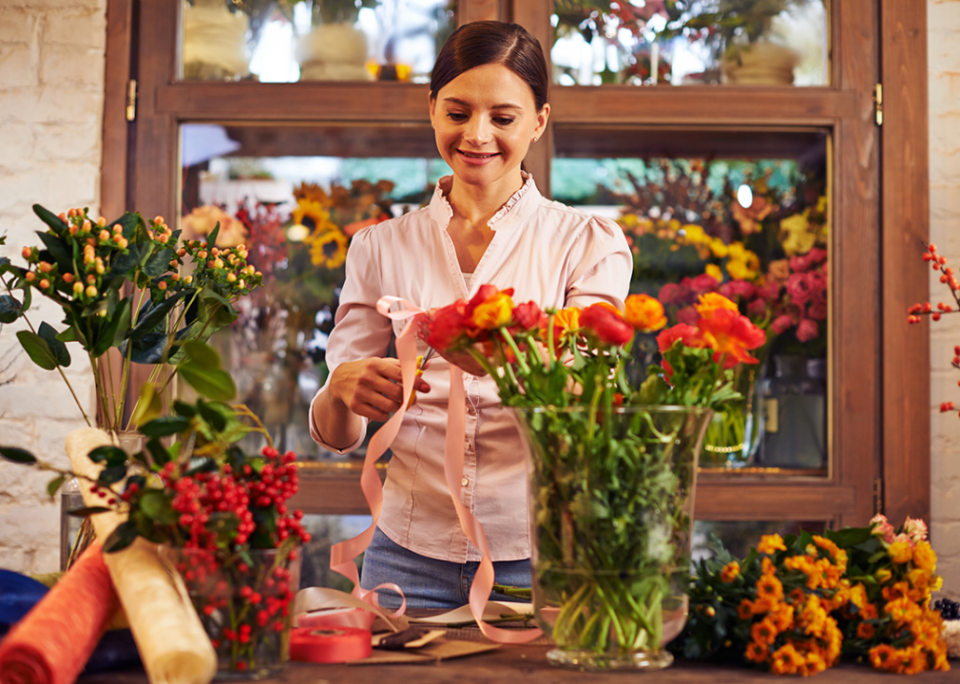 Floral designer making bouquets.