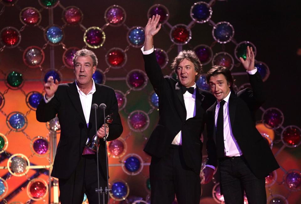 (L-R) Top Gear presenters, James May, Richard Hammond and Jeremy Clarkson collect the Most Popular Factual Programme award at the 2011 National Television Awards at the O2 Arena, London.