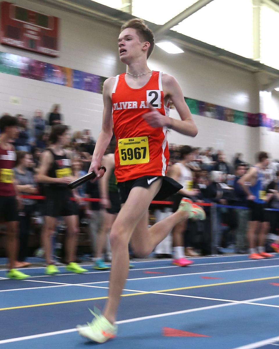 Oliver Ames’s Brendan Thomas is a blur of motion while running in the 4X800 meter relay race at the MIAA Meet of Champions at the Reggie Lewis Track Center in Boston on Saturday, Feb. 25, 2023.