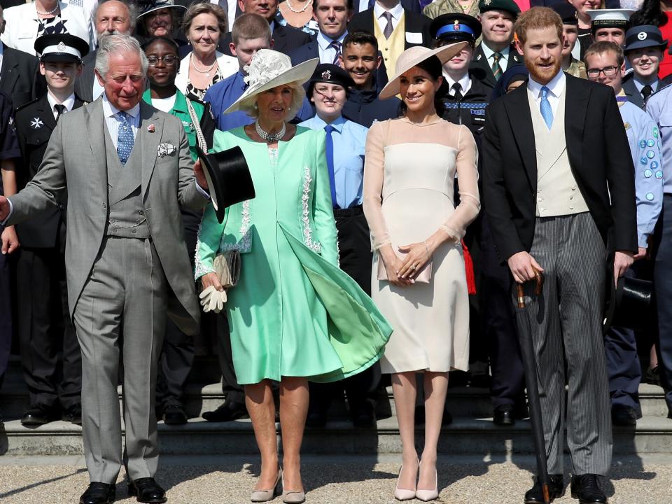 Prince Harry, Duke of Sussex, Prince Charles, Prince of Wales, Camilla, Duchess of Cornwall, Meghan, Duchess of Sussex and guests pose for a photograph as they attend The Prince of Wales' 70th Birthday Patronage Celebration held at Buckingham Palace on May 22, 2018 in London, England