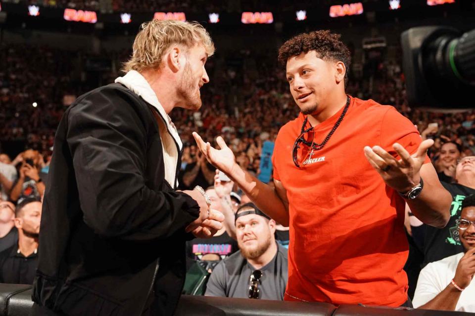 <p>WWE/Getty</p> Patirck Mahomes and Logan Paul