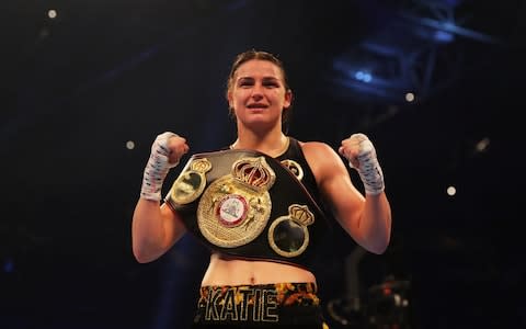 Katie Taylor celebrates victory after the WBA Lightweight World Championship contest against Anahi Sanchez - Credit: Getty