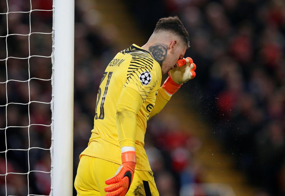 <p>Soccer Football – Champions League Quarter Final First Leg – Liverpool vs Manchester City – Anfield, Liverpool, Britain – April 4, 2018 Manchester City’s Ederson looks dejected after Liverpool’s Sadio Mane (not pictured) scored their third goal REUTERS/Andrew Yates </p>