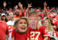 <p>Kansas City Chiefs fans wear Hillary Clinton and Donald Trump masks during the game bethween the Chiefs and the New York Jets at Arrowhead Stadium on September 25, 2016 in Kansas City, Missouri. (Photo by Jamie Squire/Getty Images) </p>