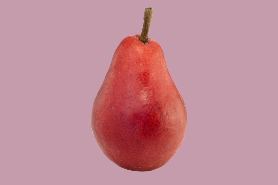 Starkrimson pear on pink background