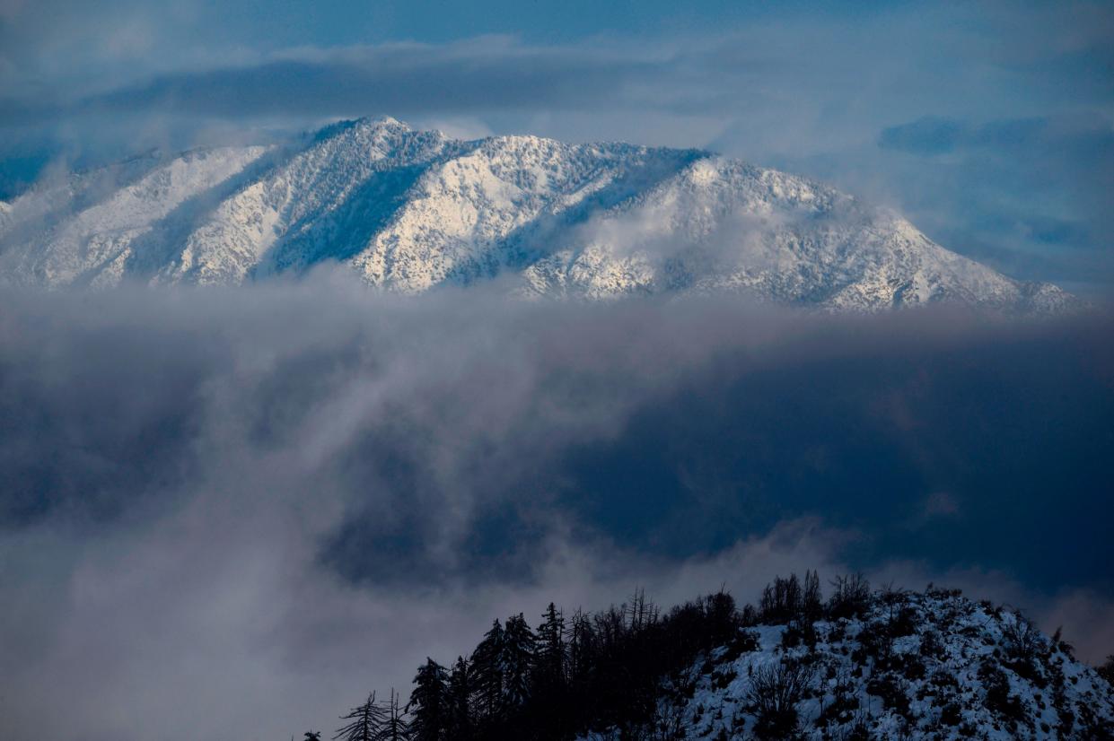 Mount Baldy is covered in snow in the Angeles National Forest north of Los Angeles, California on December 26, 2019 after a cold winter storm brought heavy rain, snow and strong winds to Southern California. (Photo by Robyn Beck / AFP) (Photo by ROBYN BECK/AFP via Getty Images) ORIG FILE ID: AFP_1NB6NY