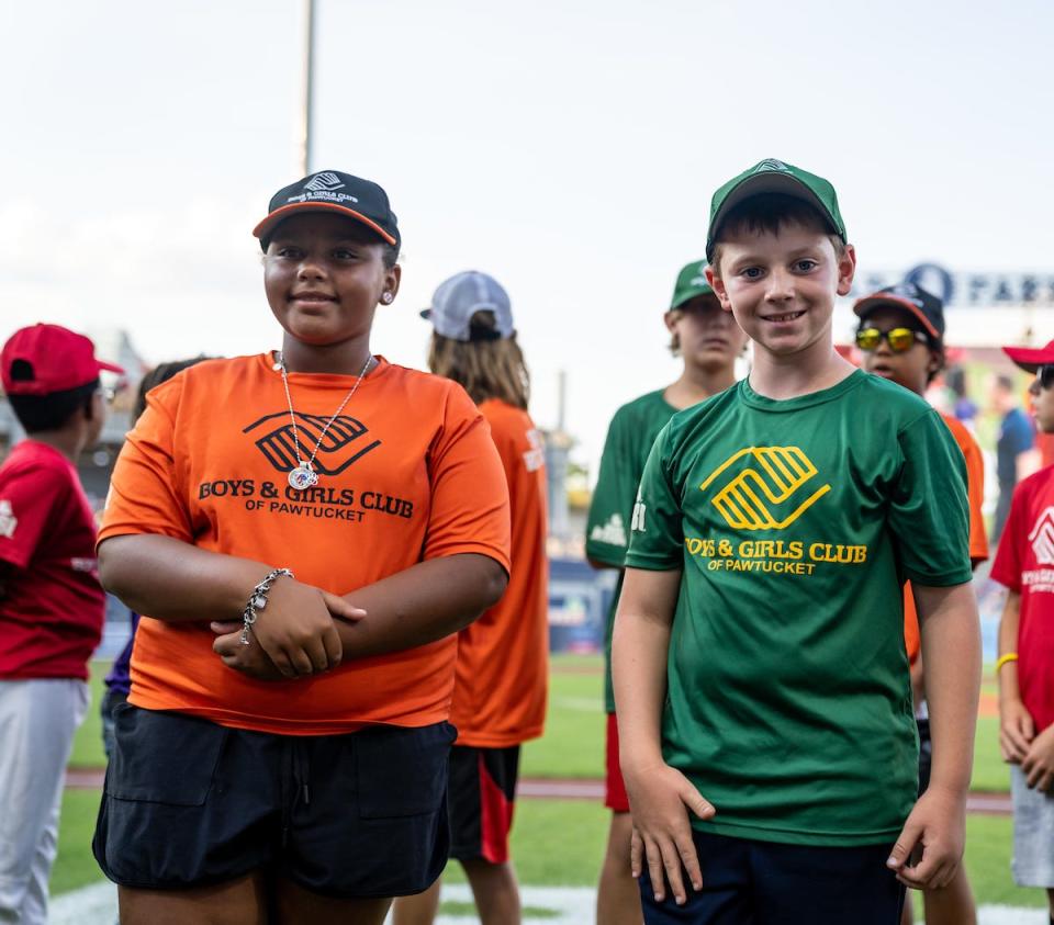 From left, Nallah Goss, 10, from Pawtucket, R.I. and Nolan Myers, 9, from East Providence, R.I. were honored by the Worcester Red Sox last Friday for winning a trip to the World Series. The team and the Pawtucket Boys and Girls Club have arranged for Rhode Island youth to attend a World Series game for the past 72 years, and have continued the tradition when the franchise moved to Worcester.