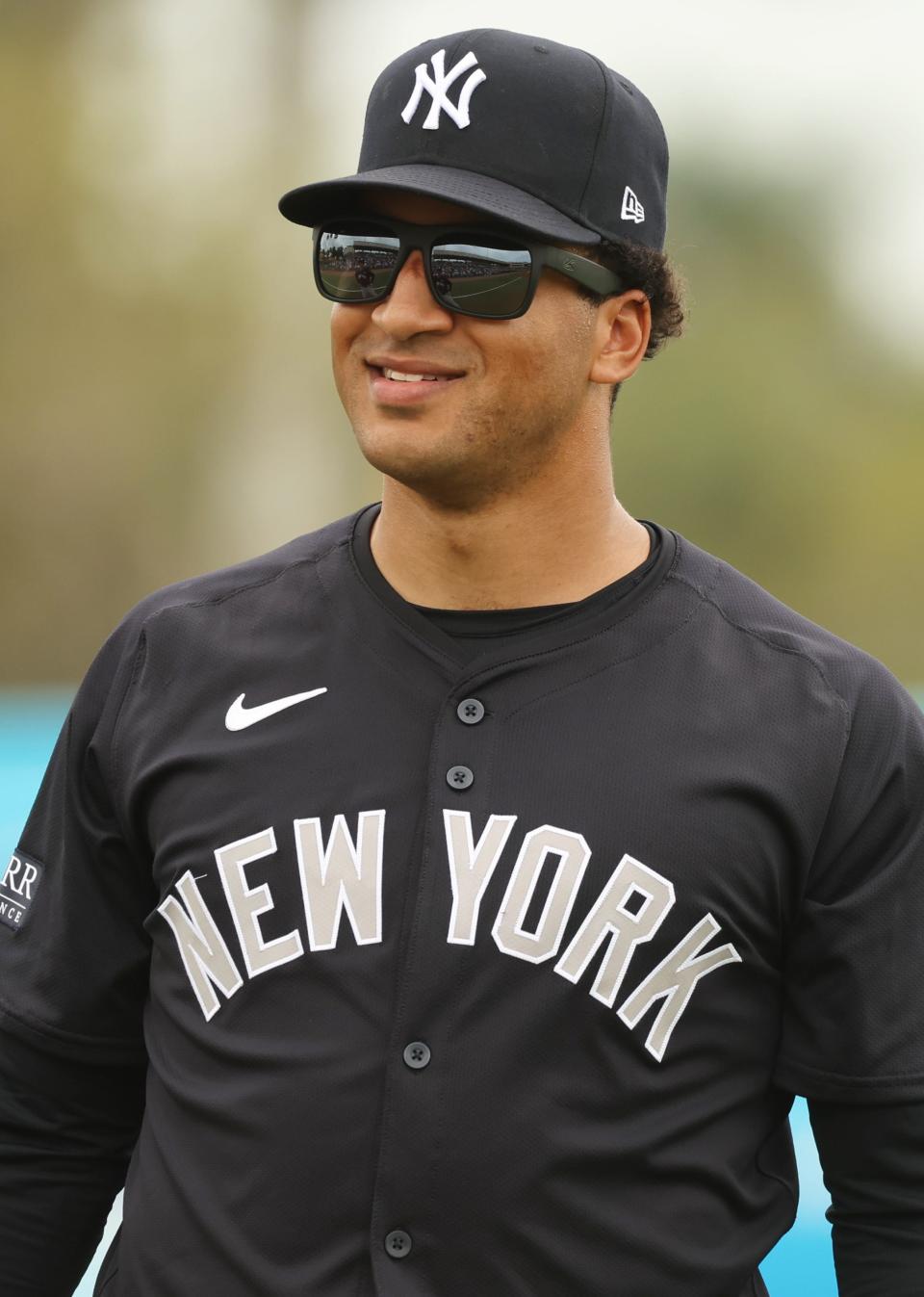 New York Yankees center fielder Trent Grisham (12) at Ed Smith Stadium during spring training.