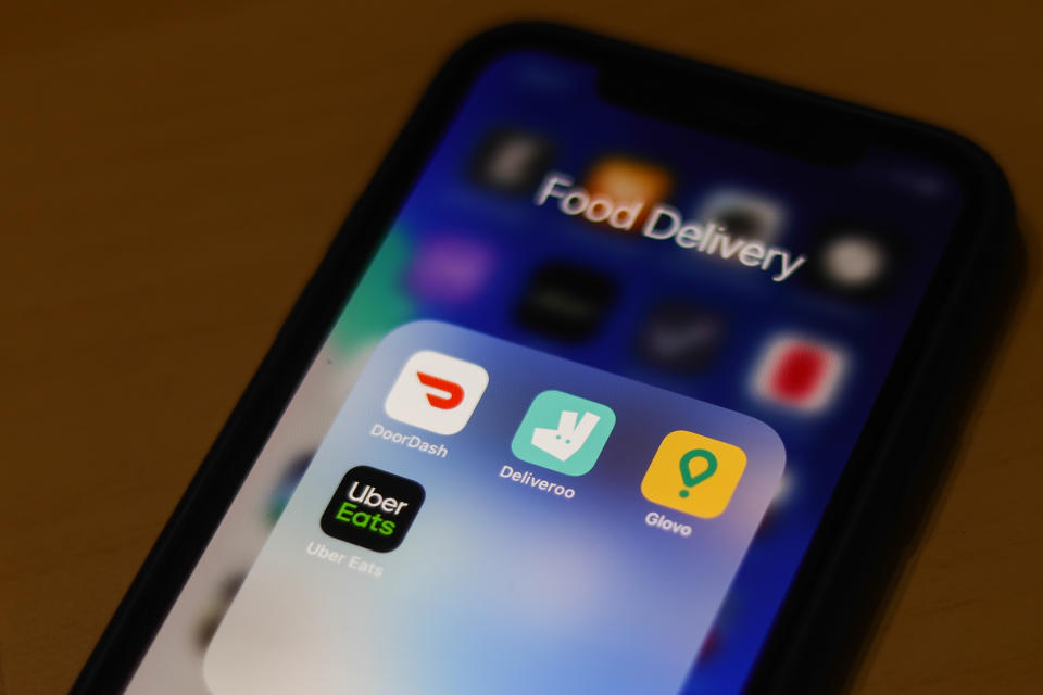 DoorDash, Deliveroo, Glovo and Uber Eats apps icons are seen on the smartphone screen in this illustration photo taken in Krakow, Poland on March 17, 2020. (Photo by Jakub Porzycki/NurPhoto via Getty Images)