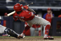 Philadelphia Phillies' Didi Gregorius ducks under a high pitch from the New York Yankees during the ninth inning of a baseball game Wednesday, July 21, 2021, in New York. (AP Photo/Adam Hunger)