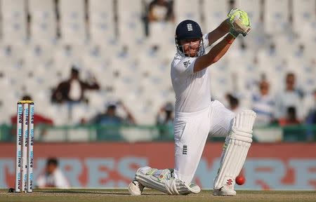Cricket - India v England - Third Test cricket match - Punjab Cricket Association Stadium, Mohali, India - 26/11/16. England's Jonny Bairstow plays a shot. REUTERS/Adnan Abidi