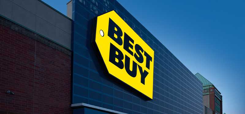 A Best Buy logo on the front of a store.