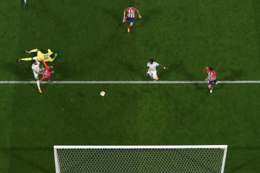 Atletico Madrid's French forward Antoine Griezmann scores the second goal during the UEFA Europa League final against Olympique de Marseille