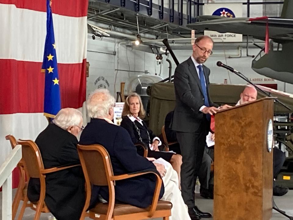 Yannick Tagand, the consul general of France to the Midwest, addresses Walter B. Stitt and Leonard Giorgio before presenting them with the French Legion of Honor. The medals were given Saturday morning at the MAPS Air Museum in Green. They recognize Stitt and Giorgio for their service in France during World War II.