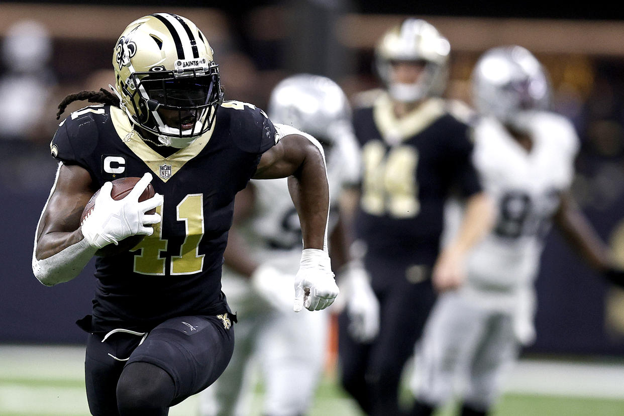 Alvin Kamara of the New Orleans Saints runs the ball during an NFL game on Oct. 30. (Sean Gardner/Getty Images)