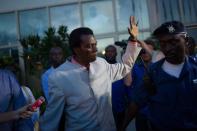 Audifax Ndabitoreye, the head of the Ombone Charisma opposition party, is taken into police custody at the Panoramique Hotel in Bujumbura on May 6, 2015