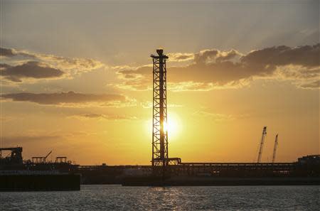 Infrastructure on D Island, the main processing hub, is pictured at sunset at the Kashagan offshore oil field in the Caspian sea in western Kazakhstan August 21, 2013. REUTERS/Stringer