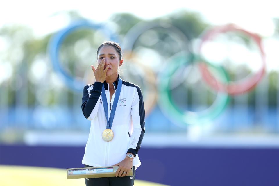 Gold medalist, Lydia Ko of Team New Zealand reacts on the podium during her national anthem in the Women's Individual Stroke Play Medal Ceremony on day fifteen of the Olympic Games Paris 2024 at Le Golf National on August 10, 2024 in Paris, France. (Photo by Andrew Redington/Getty Images)