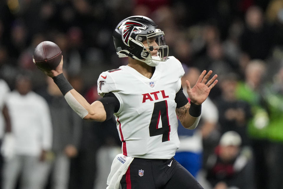 Atlanta Falcons quarterback Desmond Ridder (4) throws against the New Orleans Saints in the first half of an NFL football game in New Orleans, Sunday, Dec. 18, 2022. (AP Photo/Gerald Herbert)