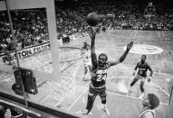 FILE - Houston Rockets' Moses Malone goes up for 31 points to lead Houston to a 92-90 victory on May 7, 1981, in Boston. (AP Photo, File)