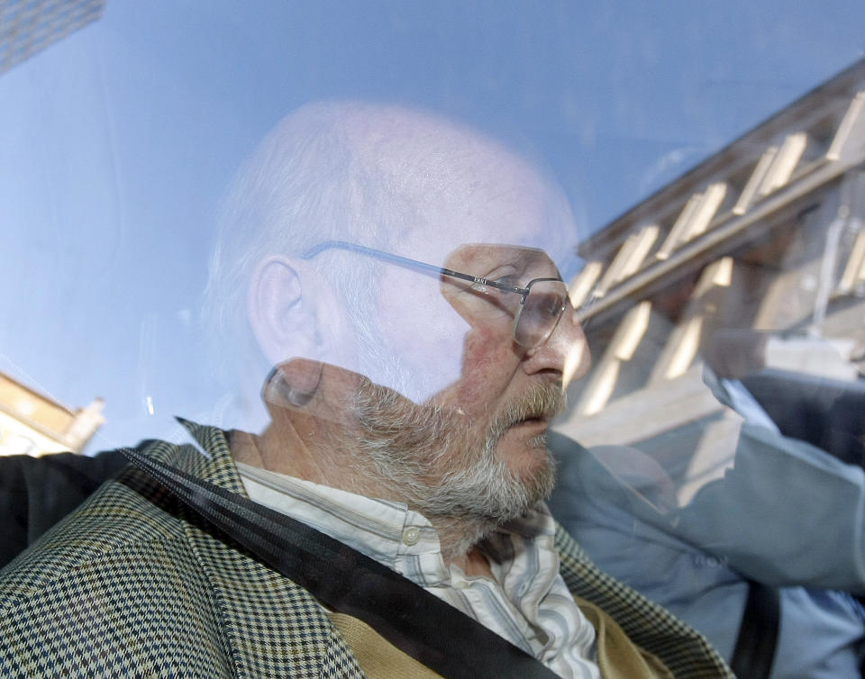 Jean-Claude Mas, the founder of Poly Implant Prothese, leaves the courthouse of Marseille, southern France, Tuesday, Dec. 10, 2013. A court has ruled that the French businessman who sold tens of thousands of faulty silicone breast implants around the world is guilty of fraud. With dozens of women looking on, the Marseille tribunal handed Jean-Claude Mas, the founder of Poly Implant Prothese, the maximum four-year prison sentence on the aggravated fraud charge. He was also ordered to pay a 75,000-euro ($103,000) fine. (AP Photo/Claude Paris)