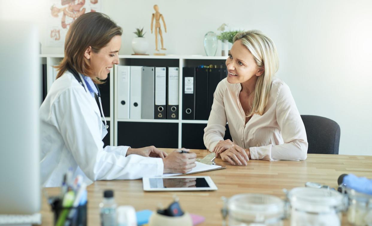 Shot of a female doctor discussing something with her patient